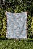 Anala Abstract Cotton Throw Blanket in Sky, outdoors