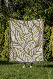 Caro Floral Cotton Throw Blanket in Chartreuse, outdoors