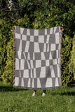 Colette Checkered Cotton Throw Blanket in Gray, outdoors