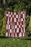 Colette Checkered Cotton Throw Blanket in Red, outdoors