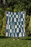 Colette Checkered Cotton Throw Blanket in Teal, outdoors