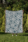 Dandelion Floral Cotton Throw Blanket in Teal, outdoors