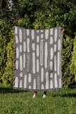 Deka Abstract Cotton Throw Blanket in Gray, outdoors