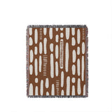 Deka Abstract Cotton Throw Blanket in Rust Brown, full view