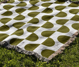 Demi Geometric Cotton Throw Blanket in Chartreuse, outdoors