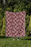 Hami Cotton Throw Blanket in Red, outdoors