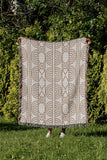 Idia Geometric Cotton Throw Blanket in Beige, outdoors