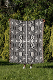 Idia Geometric Cotton Throw Blanket in Black, outdoors