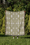 Idia Geometric Cotton Throw Blanket in Chartreuse, outdoors