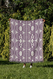 Idia Geometric Cotton Throw Blanket in Purple, outdoors
