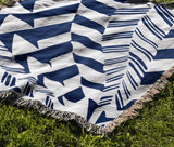 Kafi Abstract Cotton Throw Blanket in Blue, outdoors