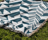 Kafi Abstract Cotton Throw Blanket in Teal, outdoors