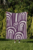 Lyno Abstract Print Cotton Throw Blanket in Purple, outdoors