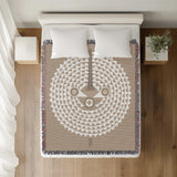 Mossi African Mask 100% Cotton Blanket in Beige, on a bed