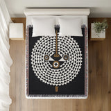 Mossi African Mask 100% Cotton Blanket in Black, on a bed