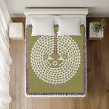 Mossi African Mask 100% Cotton Blanket in Chartreuse, on a bed