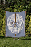 Mossi African Mask 100% Cotton Blanket in Light Blue, outdoors