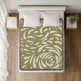 Nami Abstract Floral Blanket Throw in Chartreuse, on a bed
