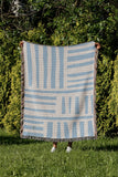 Pereto Abstract Print Cotton Throw Blanket in Sky, outdoors