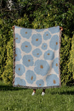 Poppi Floral Cotton Throw Blanket in Sky, outdoors