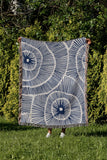 Ray Abstract Print Cotton Throw Blanket in Blue, outdoors