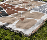 Roni Floral Cotton Throw Blanket in Beige, outdoors