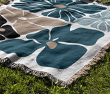 Roni Floral Cotton Throw Blanket in Teal, outdoors