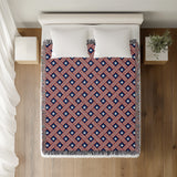 Stars and Stripes Day Cotton Throw Blanket, on a bed