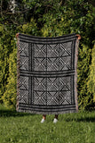 Thora Tribal Cotton Throw Blanket in Black, outdoors
