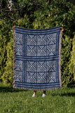 Thora Tribal Cotton Throw Blanket in Blue, outdoors