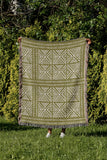 Thora Tribal Cotton Throw Blanket in Chartreuse, outdoors