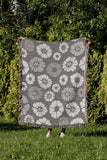 Valu Floral Cotton Throw Blanket in Gray, outdoors