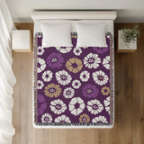 Valu Floral Cotton Throw Blanket in Purple, on a bed