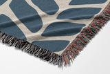 Freda Hand Woven Throw Blanket in Blue and Beige, side view