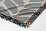 Freda Hand Woven Throw Blanket in Gray and Beige, side view