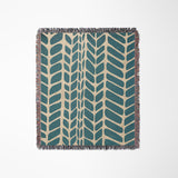 Freda Hand Woven Throw Blanket in Teal and Beige, laid flat