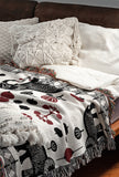 Gardo Elephant Cotton Blend Blanket Throw in Red, Black and Off-White, on a bed