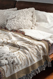 Hero Tibetan Tiger Cotton Blend Blanket Throw in Beige and Off-White, on a bed