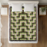 Jansen Cotton Blend Blanket Throw in Chartreuse, draped over a chair