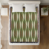 Jordyn Cotton Blend Blanket Throw in Chartreuse, on a bed