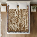 Josu Giraffe Cotton Blend Blanket Throw in Beige and Off-White, on a bed