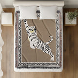 Kat Tiger Cotton Blend Blanket Throw in Beige and Off-White, on a bed