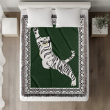 Kat Tiger Cotton Blend Blanket Throw in Green and Off-White, on a bed