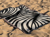 Konga Hand Woven Throw Blanket in Black and Beige, outdoors