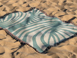 Konga Hand Woven Throw Blanket in Sky Blue and Beige, outdoors