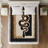 Kotu Snake Cotton Blend Blanket Throw in Black, Beige and Gray, on a bed