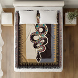 Kotu Snake Cotton Blend Blanket Throw in Brown, Beige and Gray, on a bed