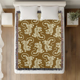 Leonard Tiger Cotton Blend Blanket Throw in Brown and Off-White, on a bed