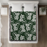 Leonard Tiger Cotton Blend Blanket Throw in Green and Off-White, on a bed