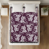Leonard Tiger Cotton Blend Blanket Throw in Purple and Off-White, on a bed